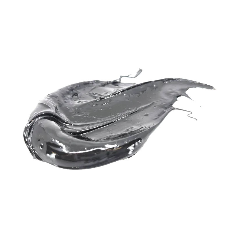 A drawn-out smear of black open-gear grease.